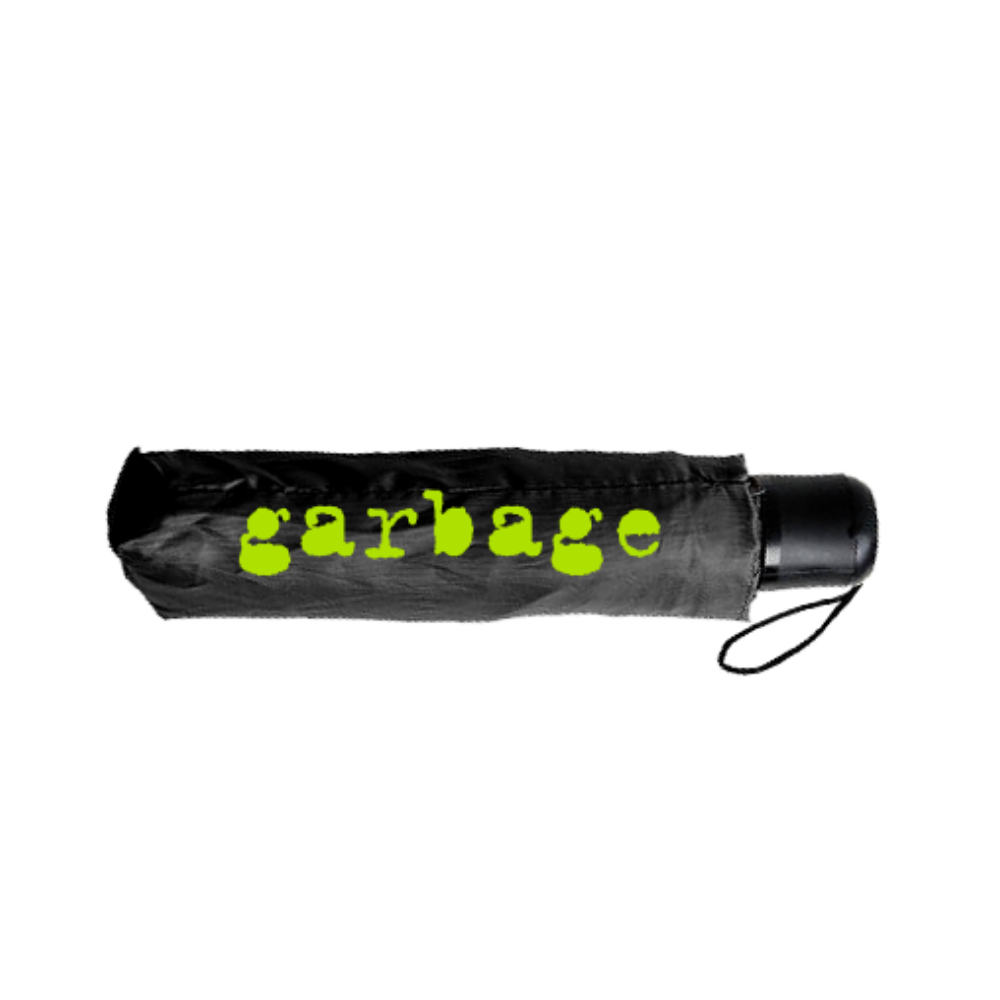 Black umbrella with ’garbage’ written in neon green letters on its canopy.