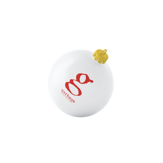 White Christmas ornament with a red logo and small yellow attachment at the top.