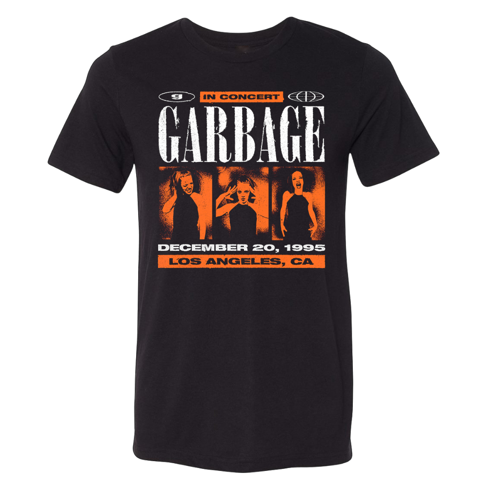 Black cotton t-shirt featuring a bold graphic of the band garbage with orange and white text announcing their december 20, 1995 concert in los angeles, ca.