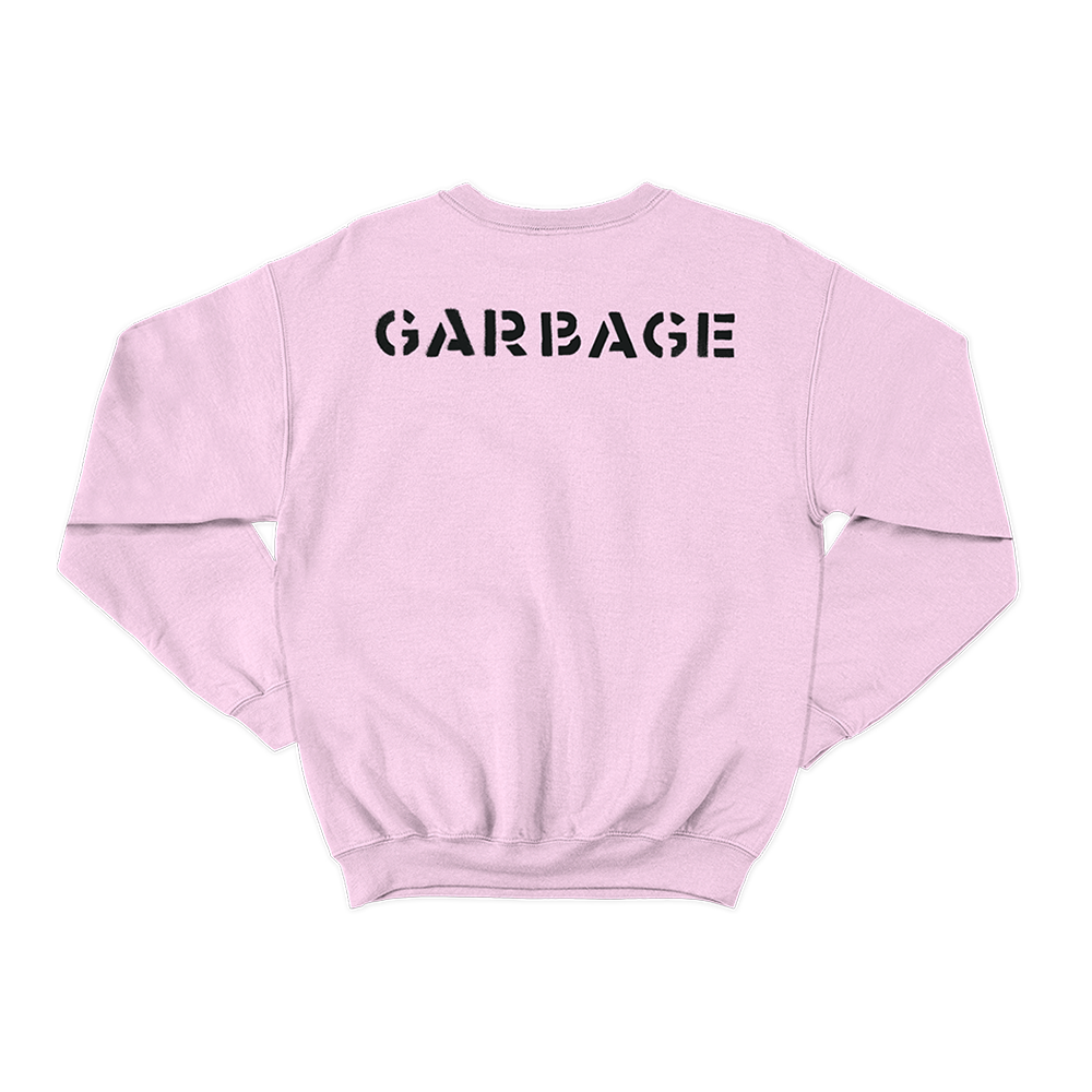 Pink sweatshirt with ’GARBAGE’ printed on the back in black letters.