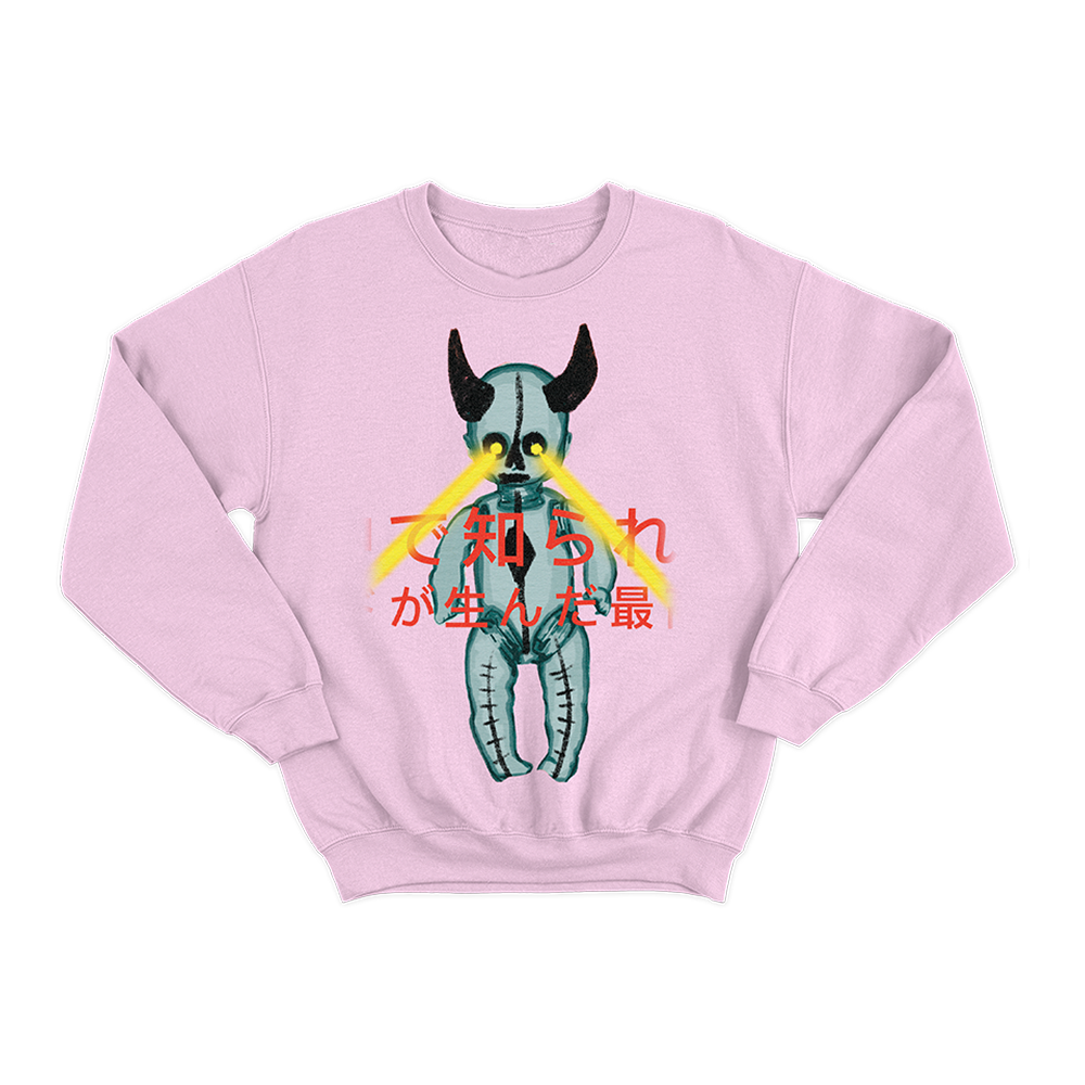 Pink sweatshirt featuring a graphic design of a horned creature with Japanese text.