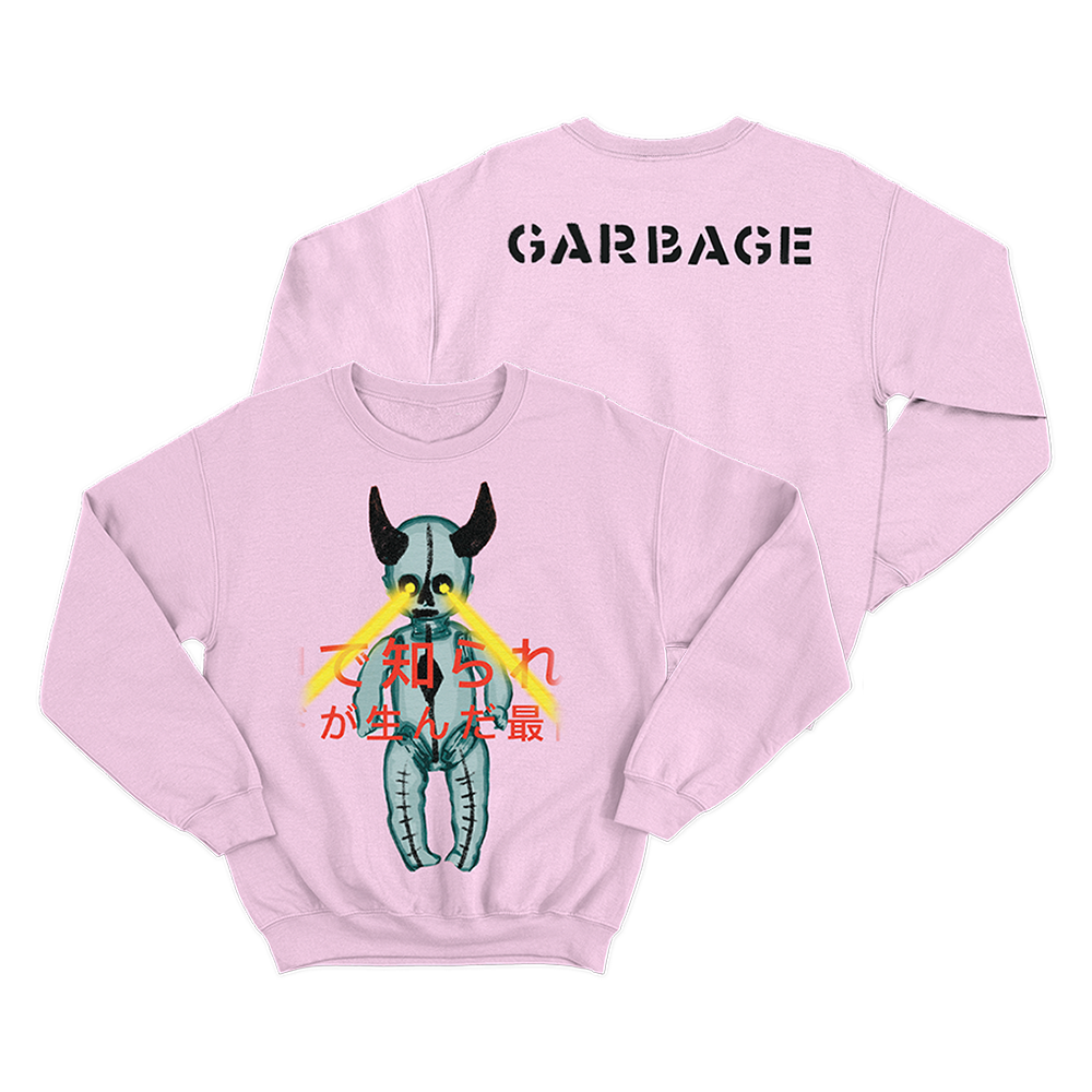 Pink sweatshirt with a graphic design featuring a horned creature and Japanese text on the front, and ’GARBAGE’ printed on the back.