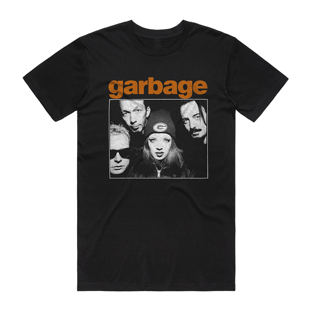 Official Garbage Merchandise. 100% black cotton t-shirt with a vintage photo of the band Garbage on the front and an orange Garbage logo.