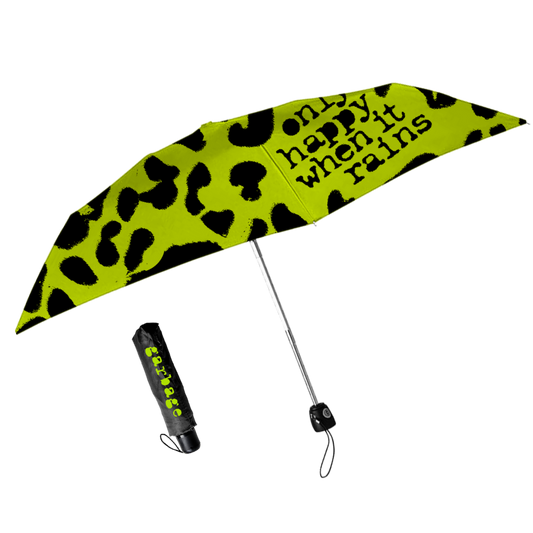 Bright green umbrella with black leopard-like spots and the phrase ’happy when it rains’ printed on it.