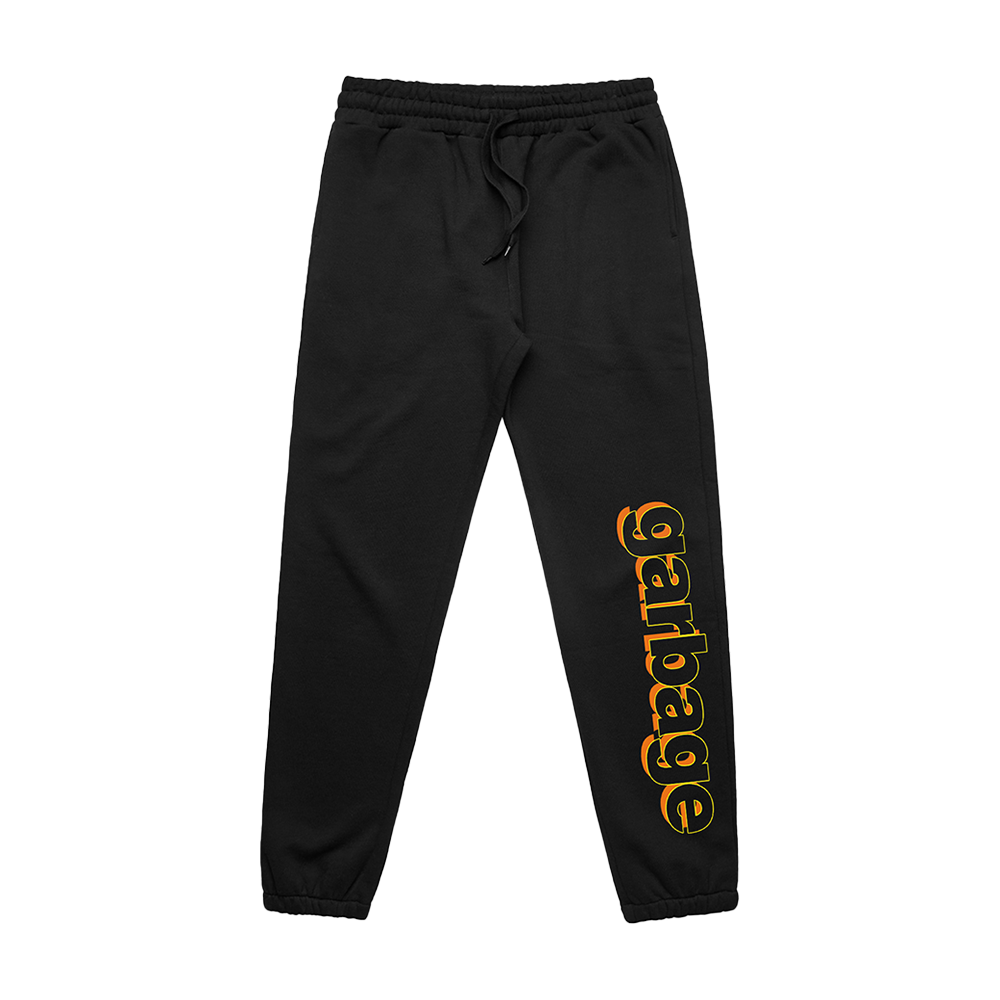 Black sweatpants with ’garbage’ printed in orange and yellow lettering on one leg.